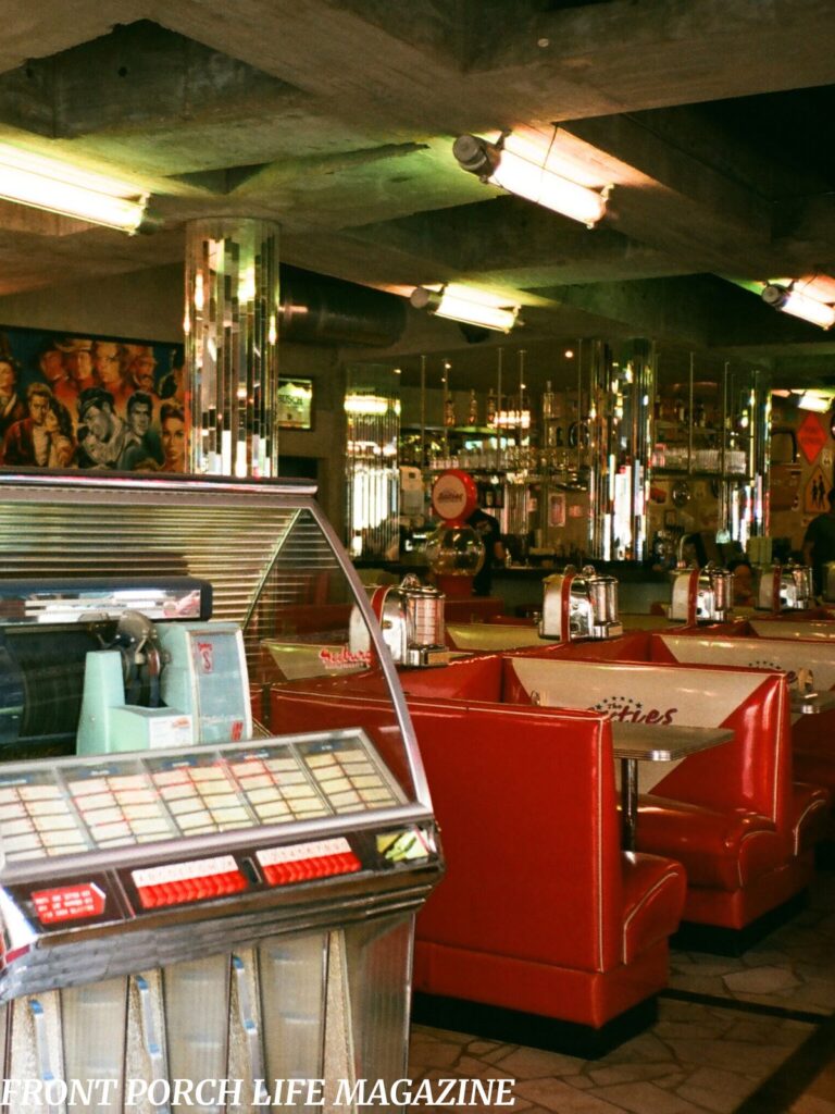 Retro diner interior with red vinyl booths and nostalgic 1950s decor