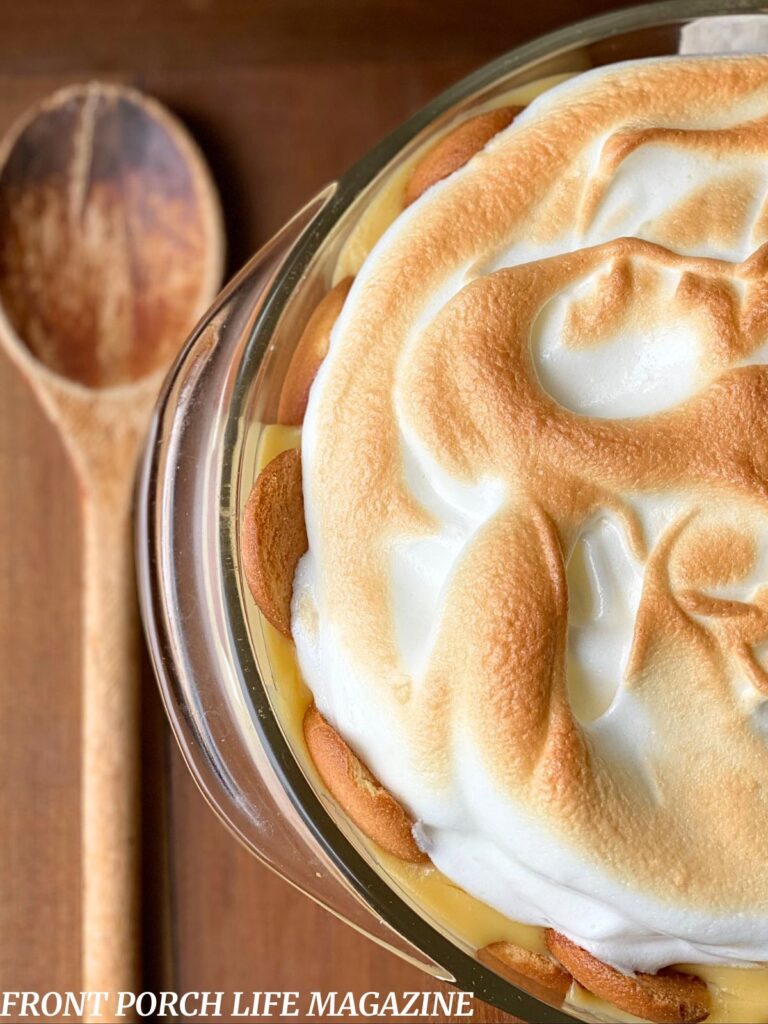 Banana pudding in a clear pyrex bowl