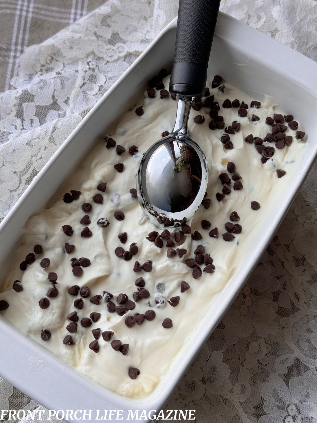 Homemade ice cream in a pan with an ice cream scoop