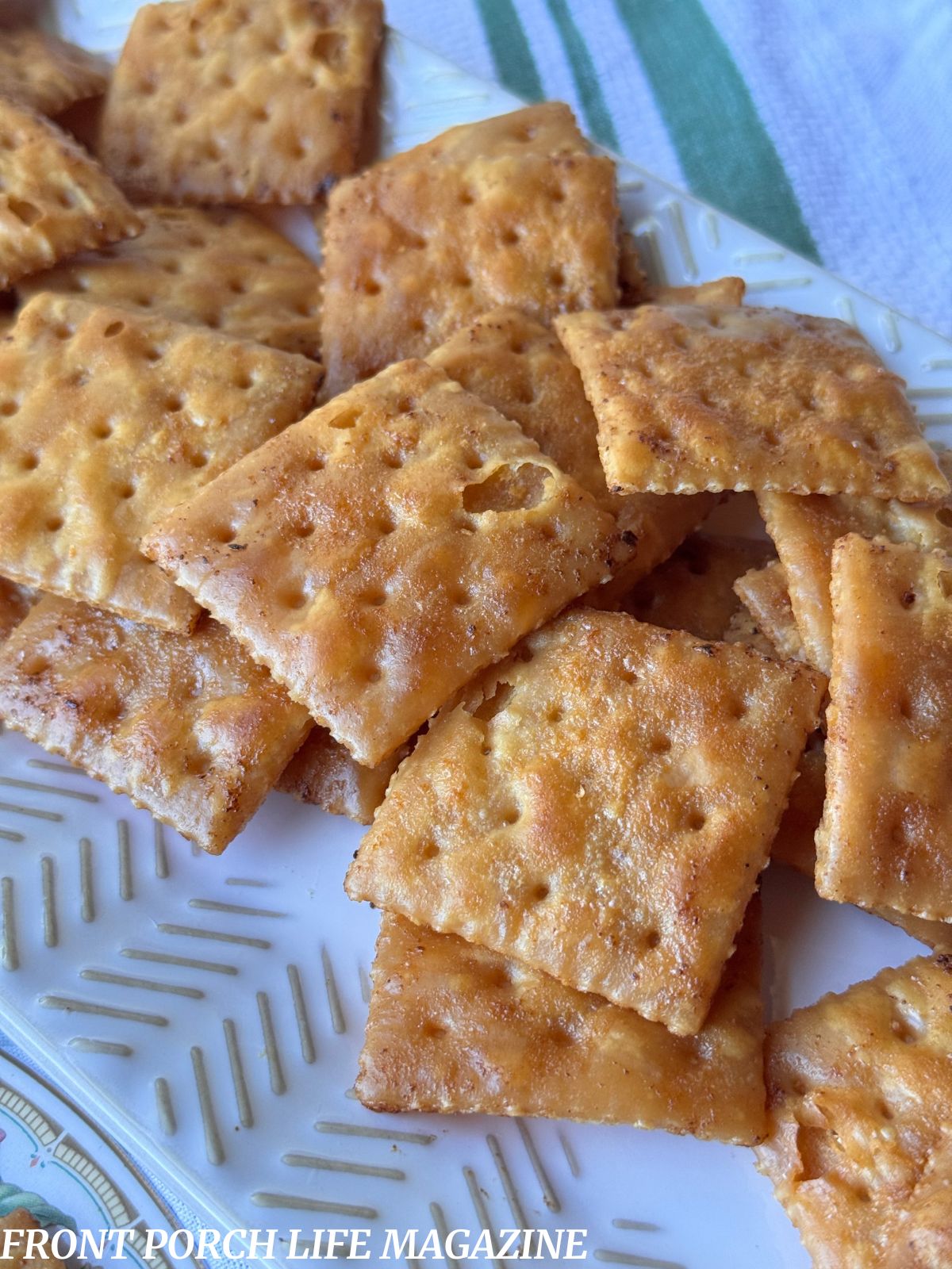 Buttered Saltine Crackers on a long white platter